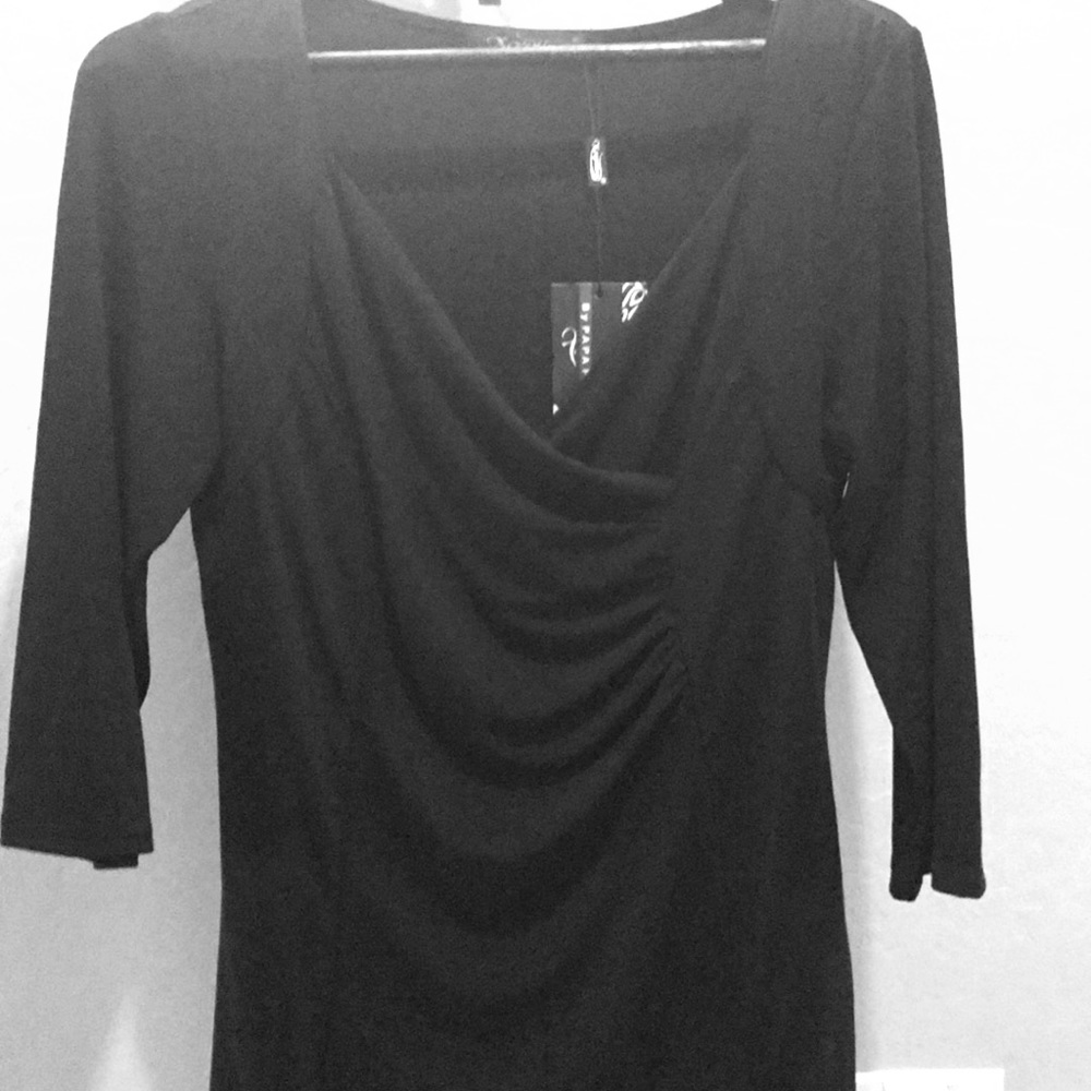 Beautiful black blouse new with tags